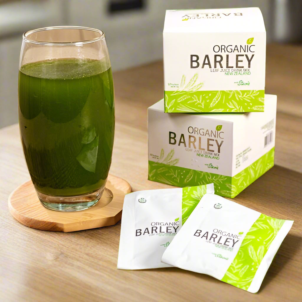 Glass of organic barley leaf juice with packaging and sachets from EA SHOPPE for health-conscious consumers
